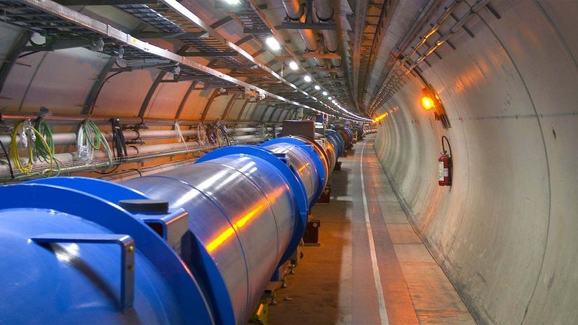 Magnets making up part of the Large Hadron Collider (LHC) particule accelerator sit inside a tunnel