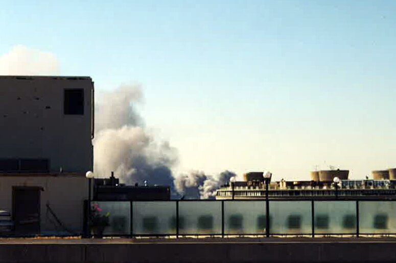 Smoke billowing from the Pentagon on September 11, 2001, as seen from the rooftop of a Washington DC building.