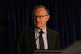 RBA governor Philip Lowe giving a speech.