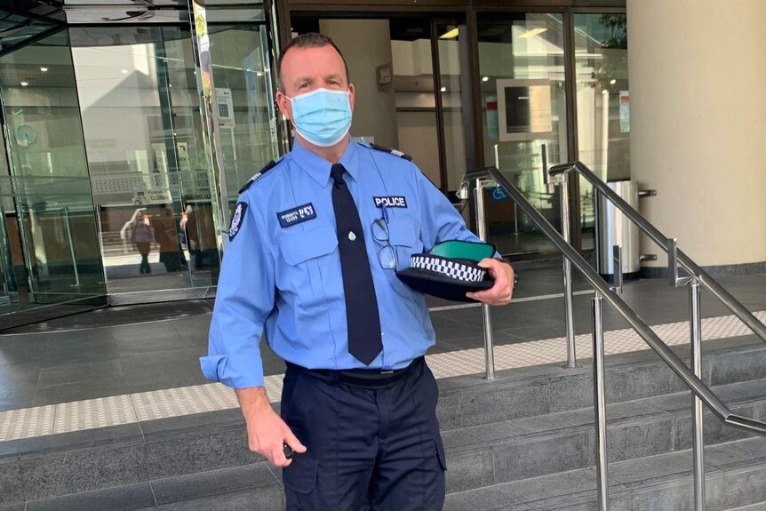 Senior Constable Ian Roberts leaves court.