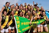 Bunbury Football Club's women's team celebrating their first flag win in 2017.