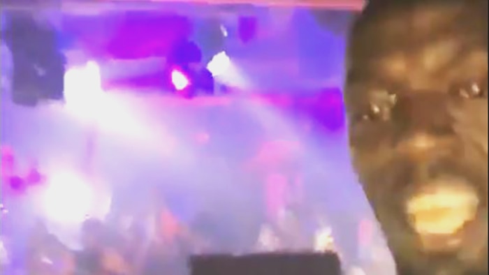 Usain Bolt in the DJ booth at a nightclub