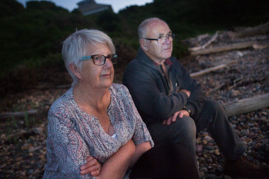 Toni and Lance waiting on the shore for the penguins