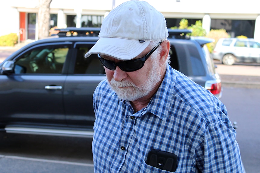 Professor Mike Lawes walks into the Darwin Local Court.