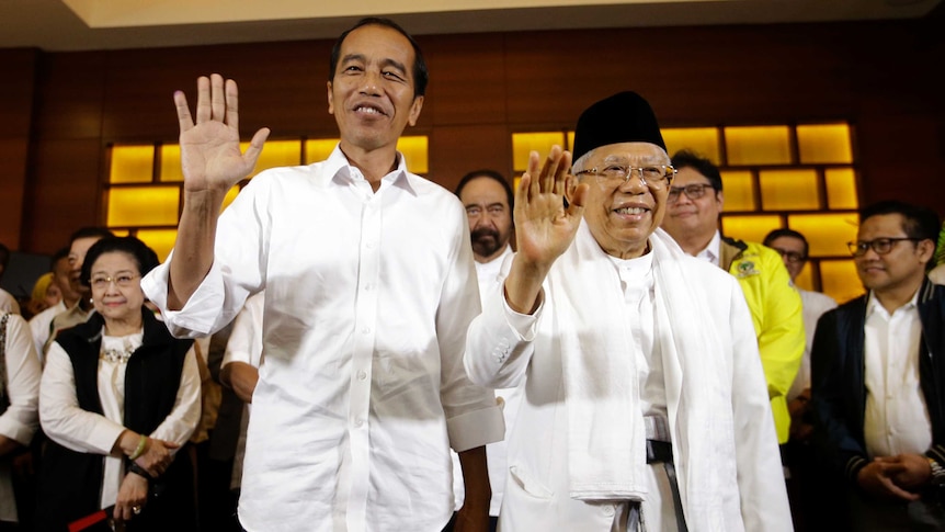 Indonesian President Joko Widodo, left, and his running mate Ma'ruf Amin.