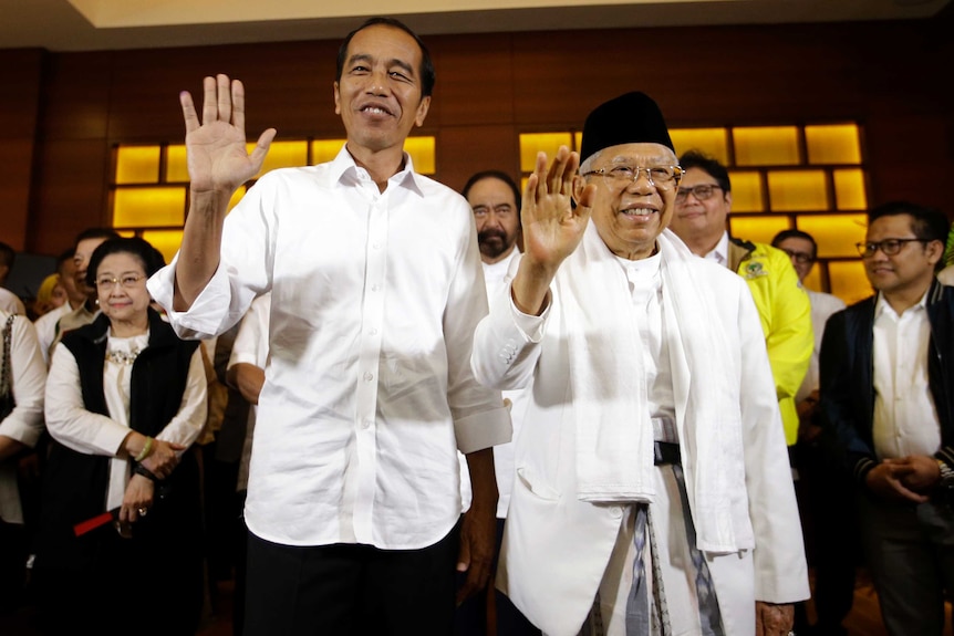 Indonesian President Joko Widodo, left, and his running mate Ma'ruf Amin.