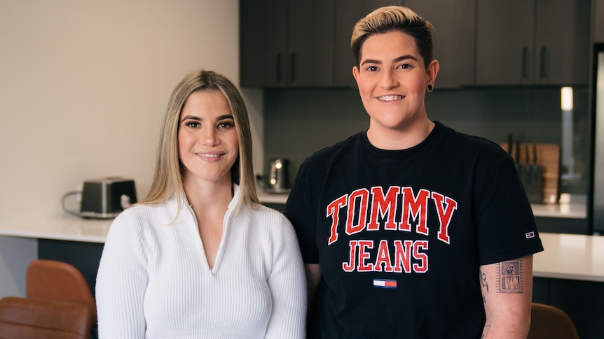 Twin sisters standing in the kitchen of their Perth home in August 2022 after an interview with Nassim Khadem. 