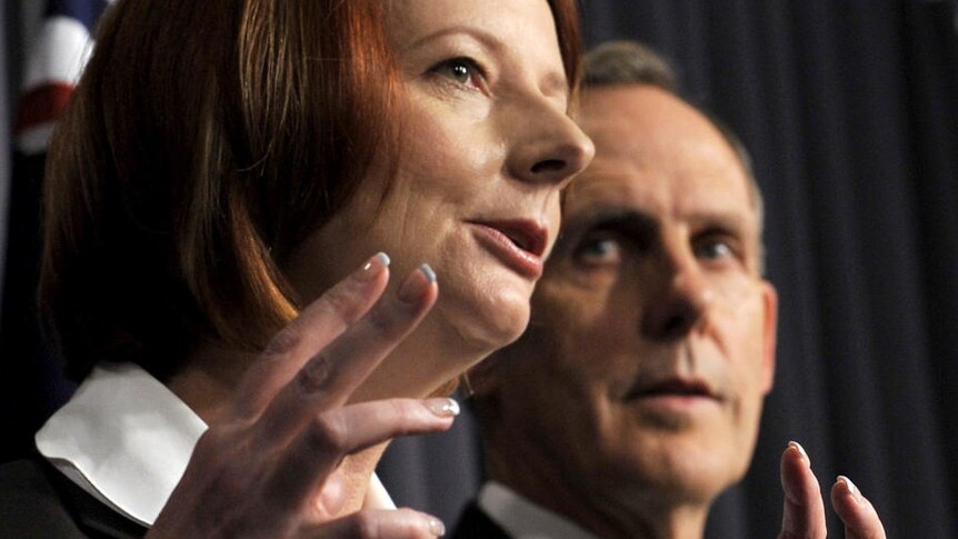 Prime Minister Julia Gillard and Greens leader Bob Brown (AAP: Alan Porritt)