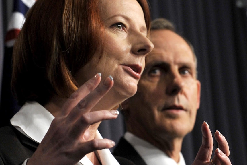 Prime Minister Julia Gillard and Greens leader Bob Brown (AAP: Alan Porritt)