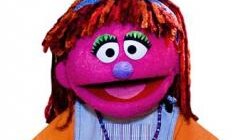A photo of Sesame Street's new character Lily, who is being used to discuss issues such as poverty