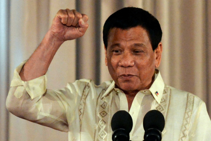 President Rodrigo Duterte gestures while speaking during an oath-taking ceremony.
