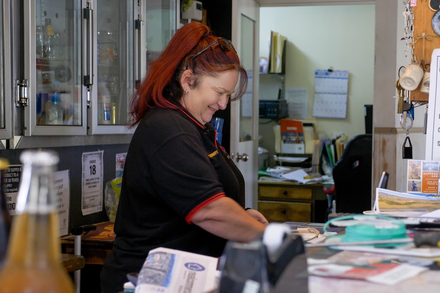 Kerry Wilson at the register at the Karara Tavern, west of Warwick, March 2023.