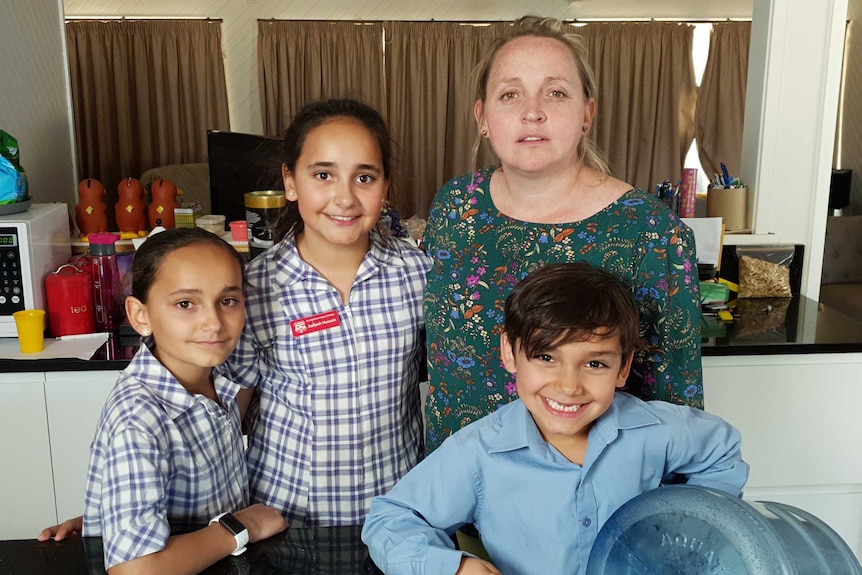 Stacey Hussain with her three children in their house