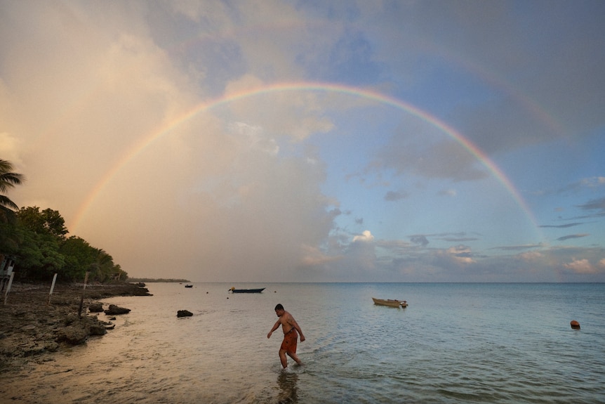 Rainbow in sky above Tuvalu