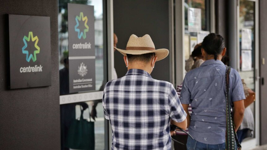 Queenslanders wait in line at Centrelink.
