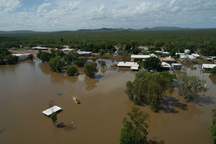 The view of Daly River from above showing flooding around buildings.