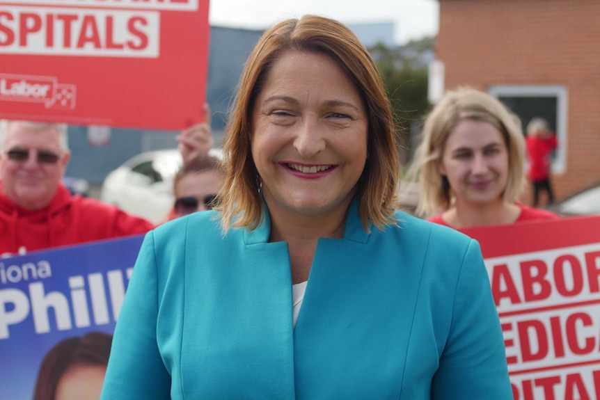 Fiona Phillips wears a blue jacket