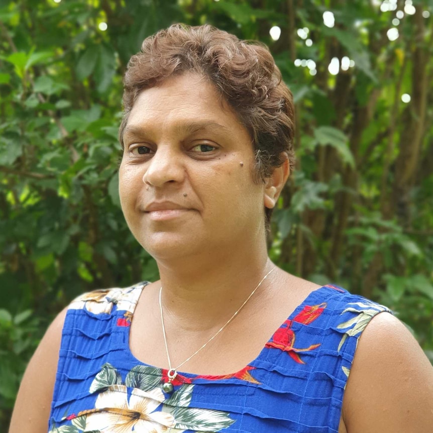 Aboriginal woman in blue dress