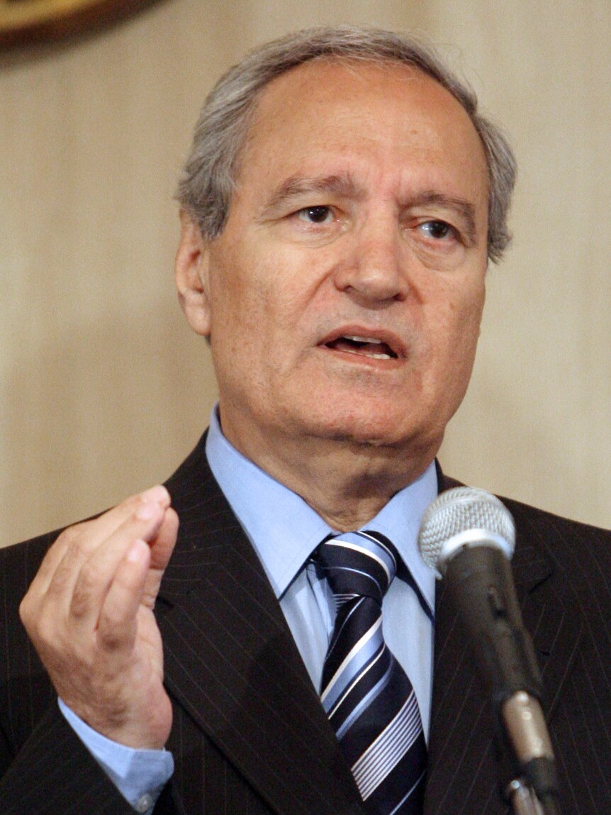 Syrian vice president Farouq al-Shara talks to reporters at a press conference