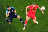 Olivier Giroud and Toby Alderweireld contest the ball