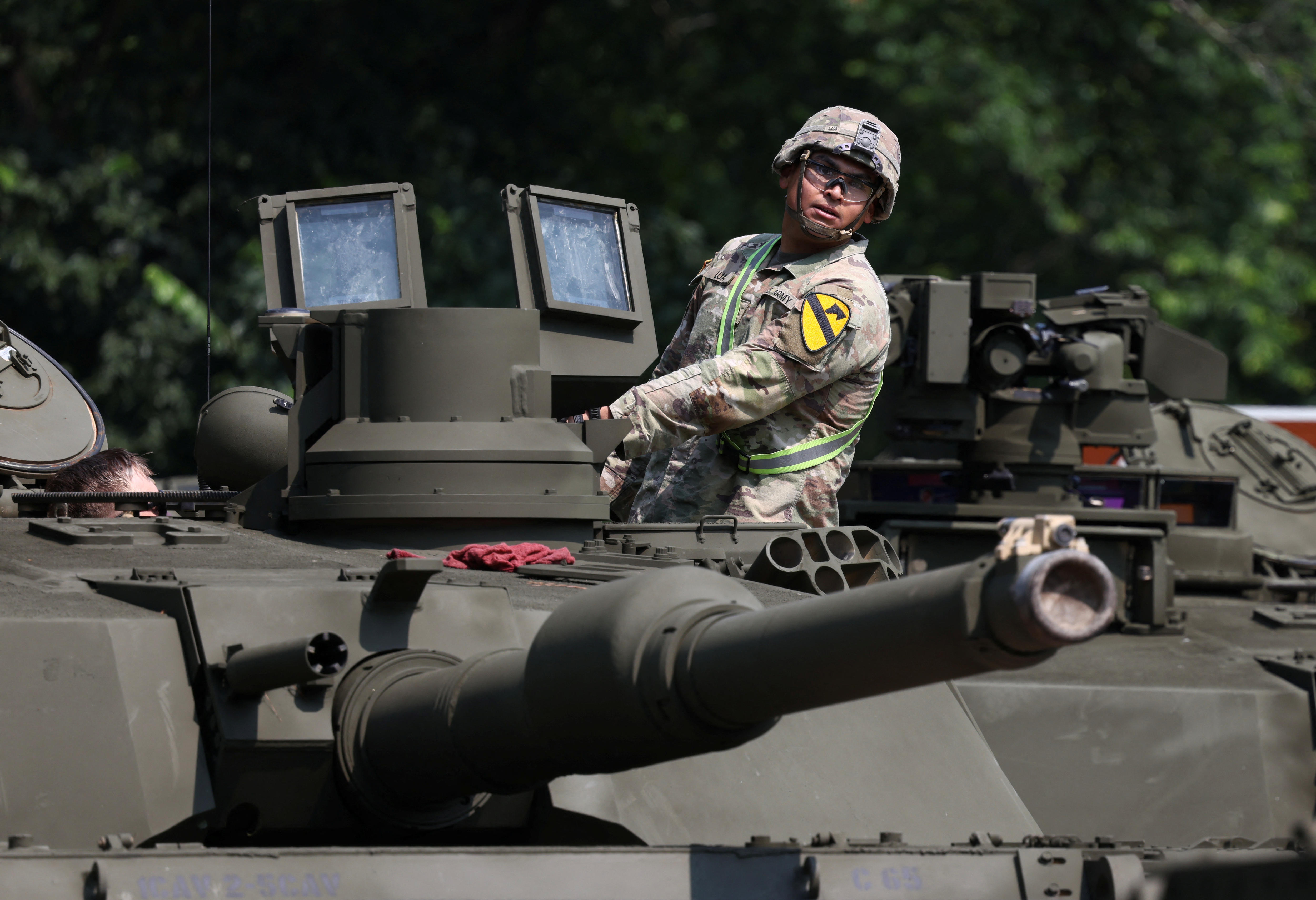 Soldier on tank