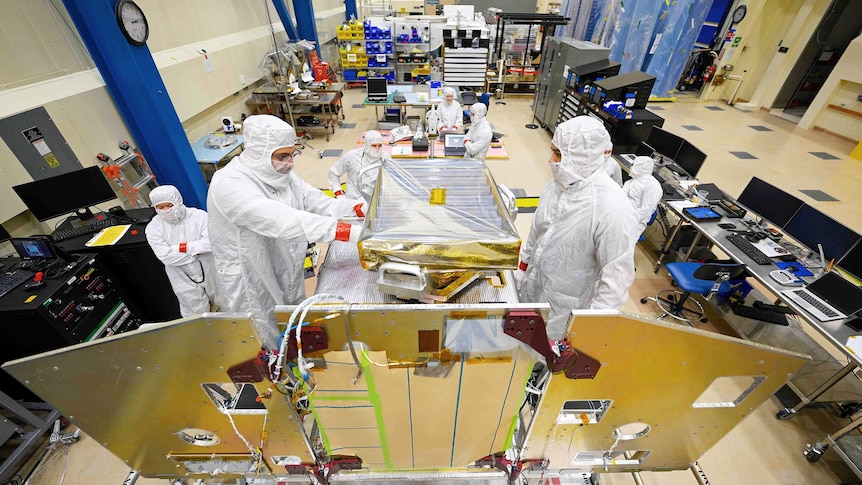 Engineers build NASA's Lunar Trailblazer spacecraft in a clean room in Littleton Colorado December 2022.