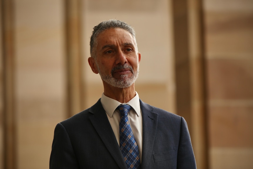 Tony Buti has a serious expression pictured outside WA Parliament.