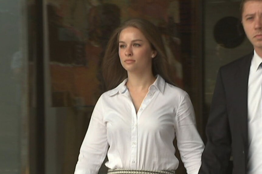 Stefanie Jones with partner David Latham leaving court in Sydney.
