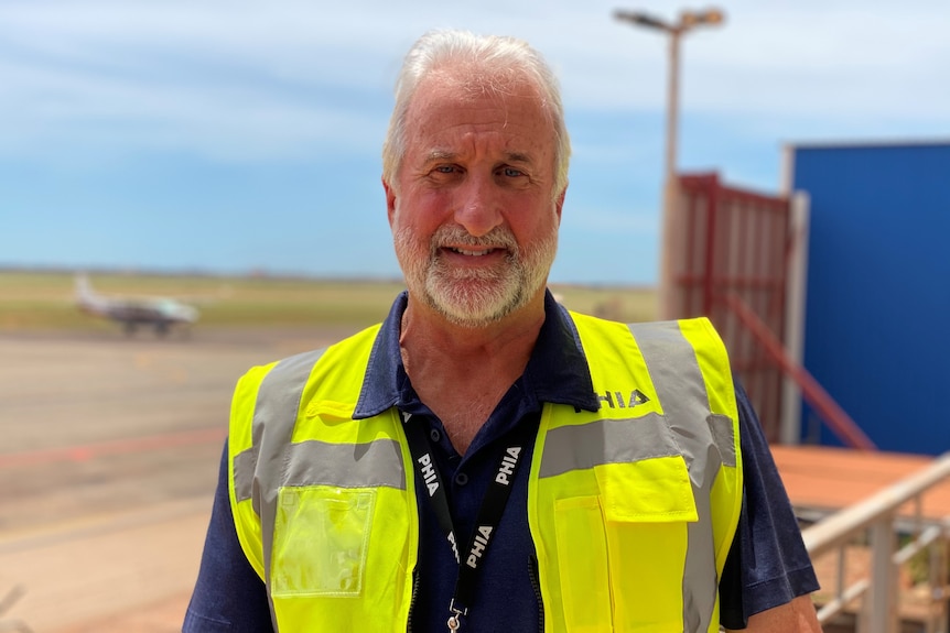 Port Hedland International Airport CEO Dave Batic standing in front of the tarmac