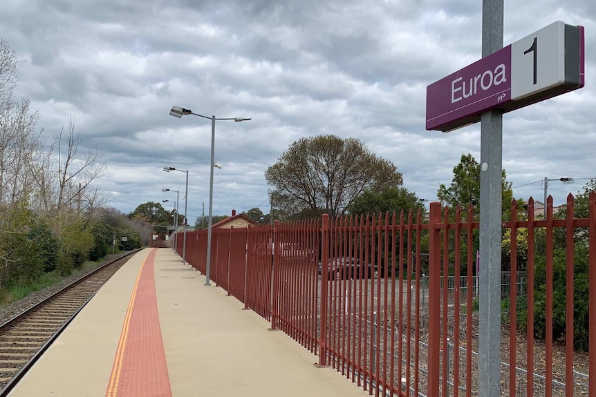 A empty train station platform at Euroa