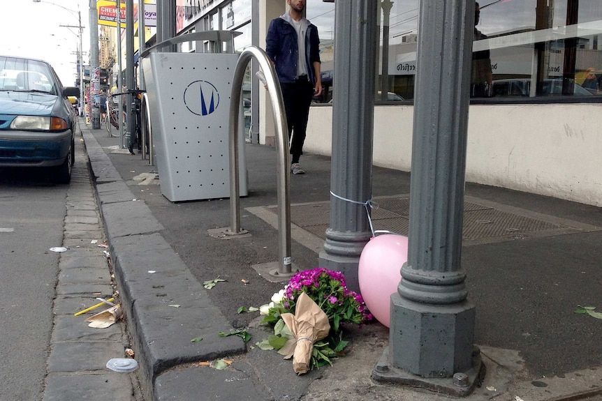 Mourners leave flowers at scene of Brunswick dooring death
