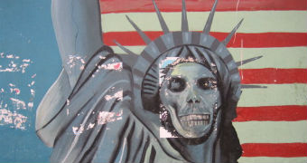 Street art painted on the walls of the former American embassy in Iran shows Lady Liberty's face as a skull