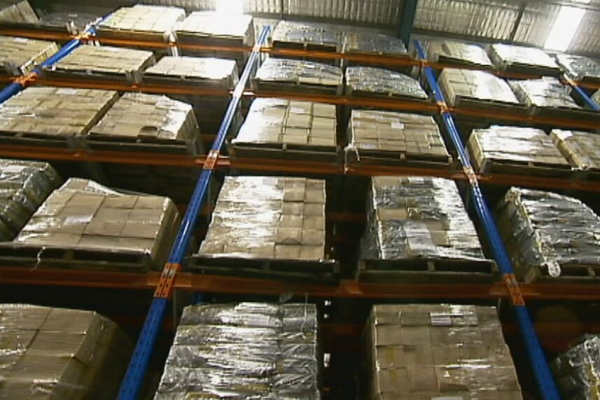 Customs shelves stacked with seized counterfeit products