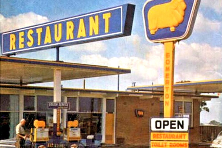 Photo of a blue and yellow golden fleece service station and restaurant. 