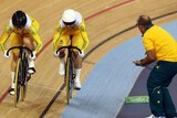 A coach shouts instructions to Kaarle McCulloch (right) and Anna Meares in the track cycling.