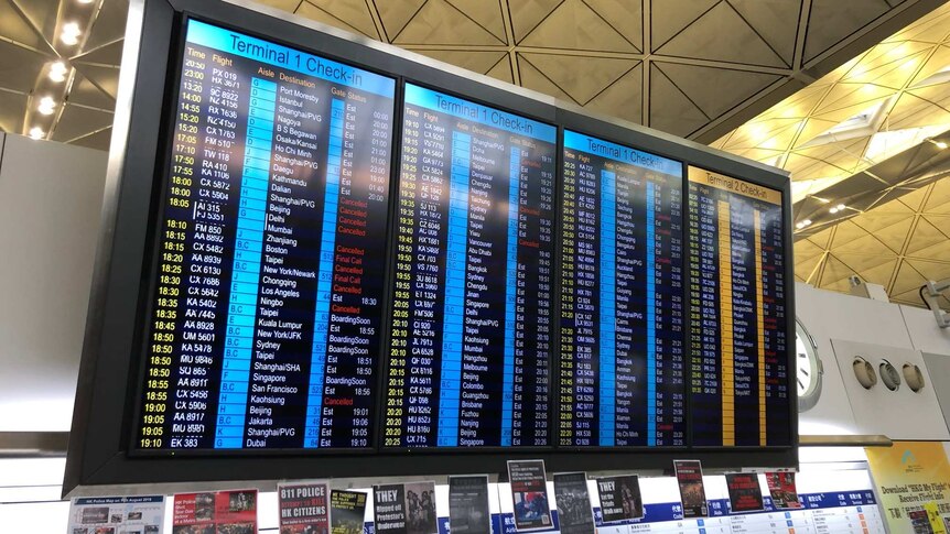 Flight status board at Hong Kong airport
