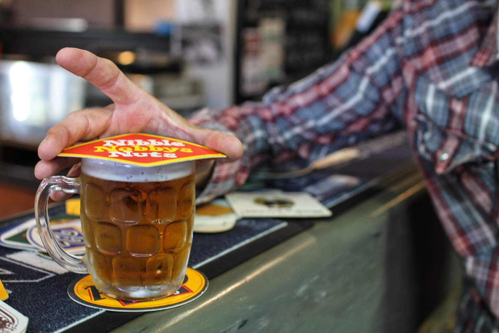 The humble beer coaster exhibited as art - ABC News