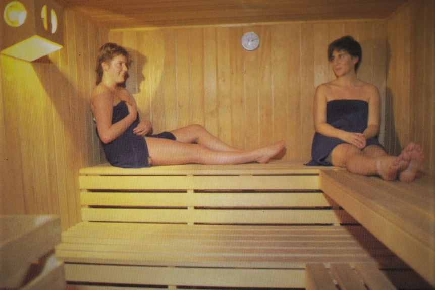 Two females enjoying a sauna.