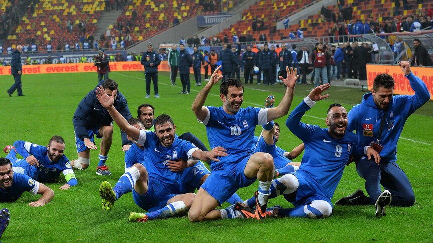 Greek players celebrate