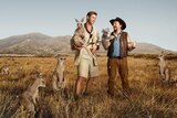 An edited Australian outback scene depicts Chris Hemsworth holding a kangaroo while Danny McBride holds a koala.