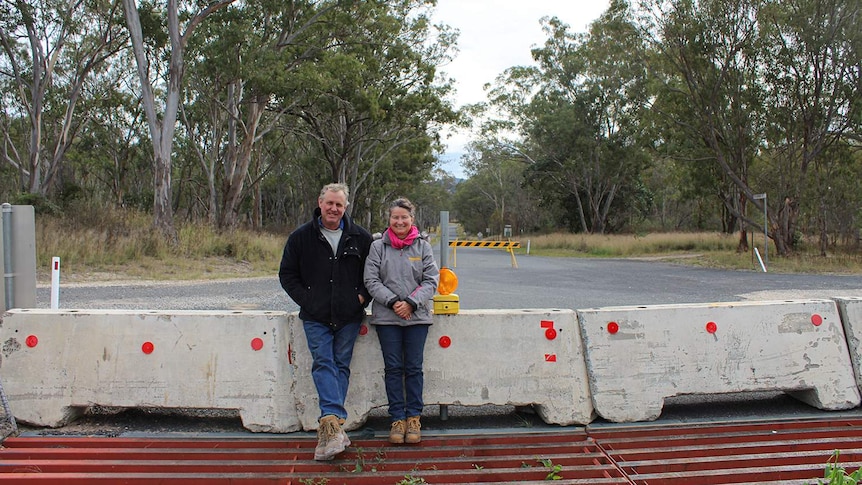 Wendy and Stuart Bell at the concrete barrier on Cullendore Road.