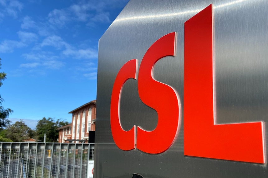 A bright red CSL logo on a metal sign.