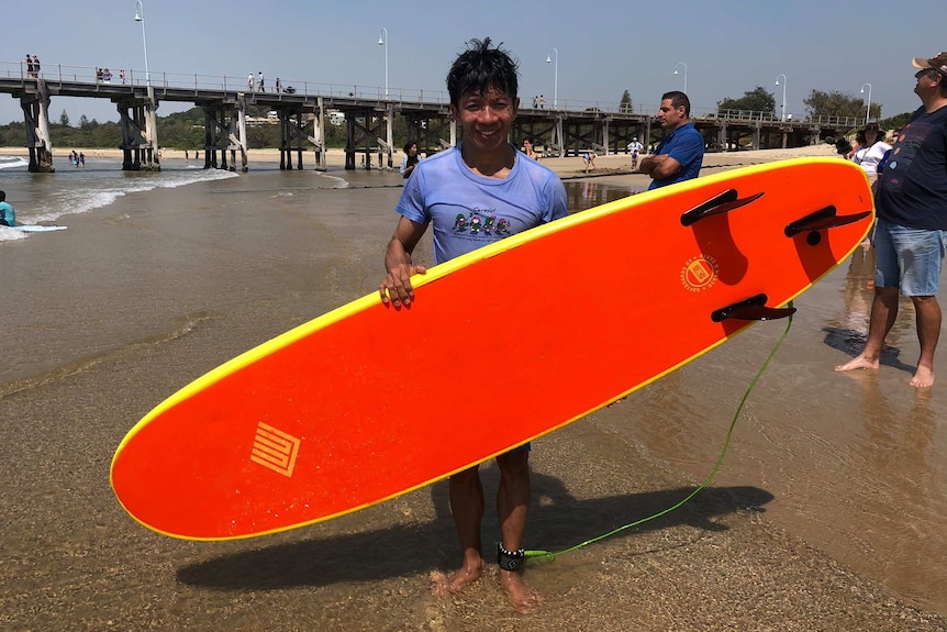 Refugees like John Thang have had little experience in the surf