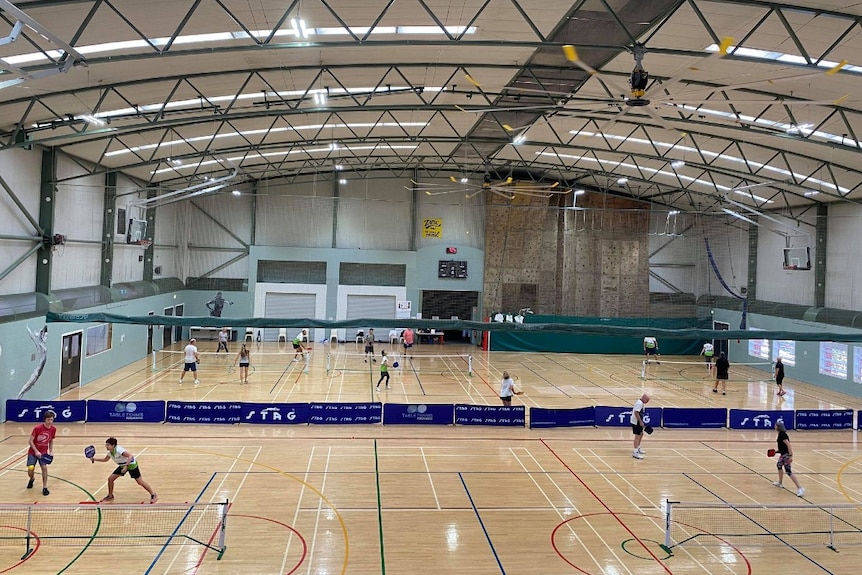 The inside of a very large sports centre.