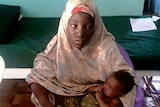 Amina Ali pictured with her baby.