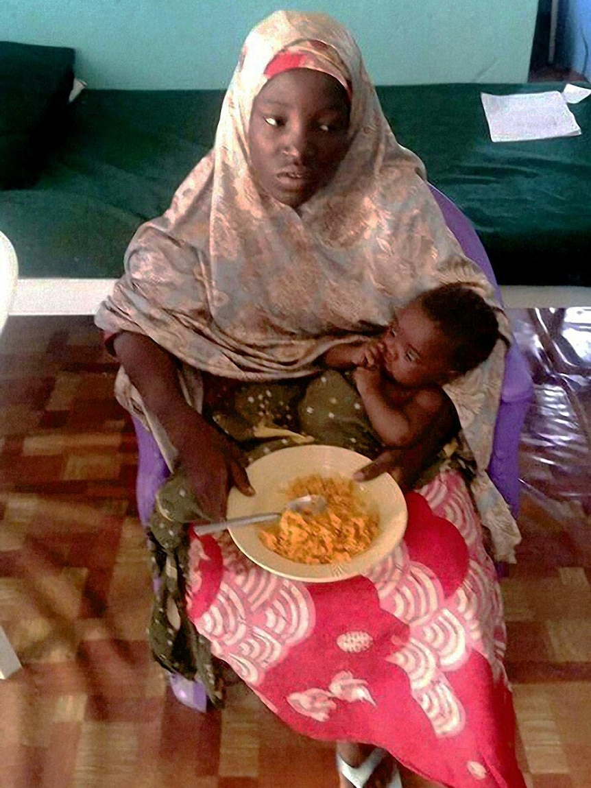Amina Ali pictured with her baby.