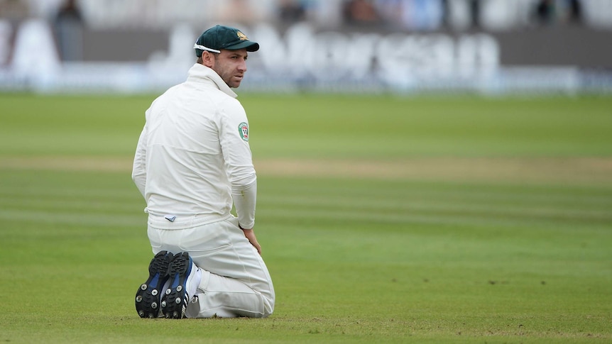 One of those days ... Phil Hughes looks on during day three at Lord's