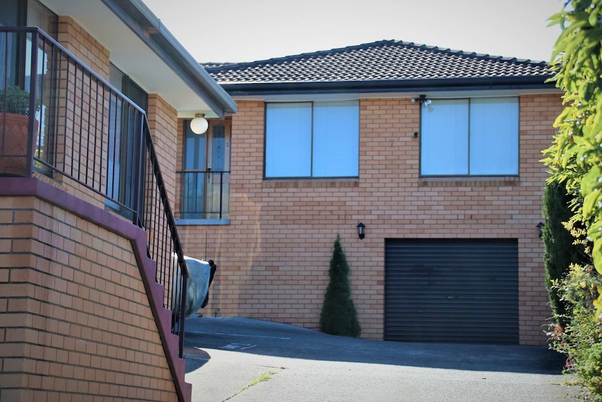 Exterior of a brick residence in Tasmania.