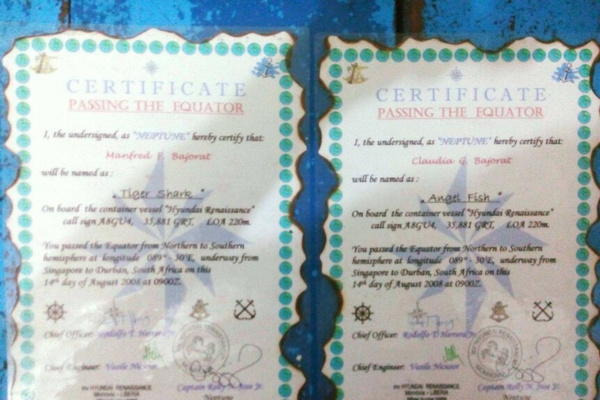 Two laminated certificates with ragged edges.