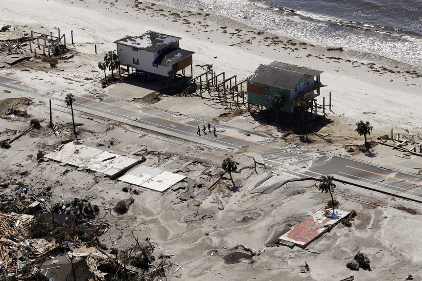 Frames and concrete bases where houses stood on Florida beach front.